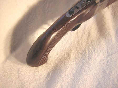 Bear_Claw_pistol_grip_Mossberg_Silver_Reserve_over_and_under_12_gauge.JPG (13873 bytes)